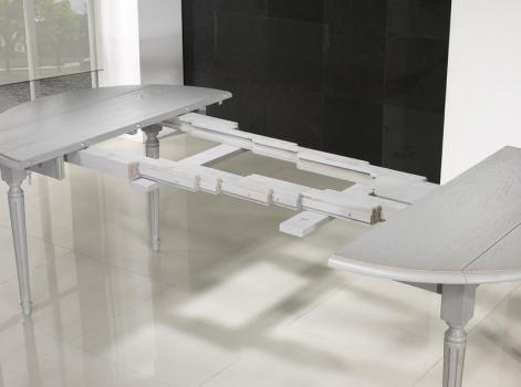 Mesa de comedor redonda fabricada en madera de roble macizo al estilo Louis Philippe diámetro 120cm con 7 extensíon de 40cm