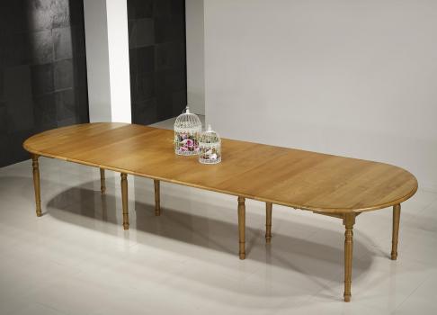 Mesa de comedor ovalada fabricada en madera de roble macizo al estilo Louis Philippe 135x110 con 7 extensiones