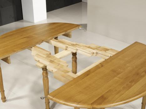 Mesa de comedor ovalada fabricada en madera de roble macizo al estilo Louis Philippe 135x110 con 7 extensiones