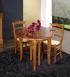 Mesa de comedor redonda extensible y con alas abatibles fabricada en madera de cerezo macizo al estilo Louis Philippe con 3 extensiones de 40cm