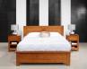 Cama colección naturaleza de 140*190 fabricada en madera de cerezo macizo de estilo contemporáneo.
