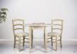 Mesa de comedor redonda  Lidia extensible y con alas abatibles fabricada en madera de Roble macizo al estilo Louis Philippe con 1 extension