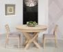 Mesa de comedor Romain fabricada en madera de roble con una pata central y una extensión tipo cartera de estilo contemporáneo