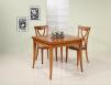 Mesa de comedor cuadrada fabricada en madera de cerezo macizo en estilo Louis Philippe 