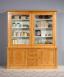 Biblioteca Nina de 2 cuerpos fabricada en madera de Cerezo dorado en estilo Directoire 
