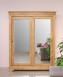 Armario Nathan de 2 puertas fabricado en madera de roble macizo con puertas corredizas espejadas al estilo Louis Philippe 