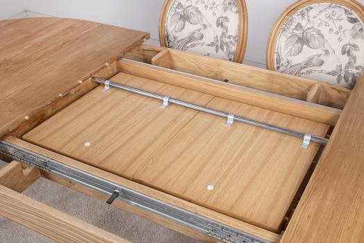 Mesa ovalada 180 x 100 en madera maciza de cerezo estilo Louis Philippe con 2 hojas incorporadas de 40 cm