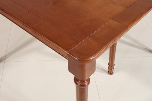 Consola o mesa extensible Catherine fabricada en madera de cerezo macizo al estilo Louis Philippe.