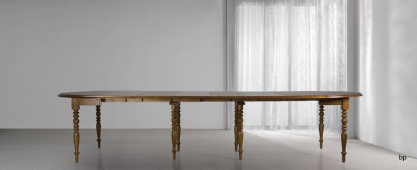 Mesa de comedor redonda con alas abatibles diámetro 120 cm  fabricada en madera de cerezo macizo al estilo Louis Philippe con 7 extensiones de 40 cm