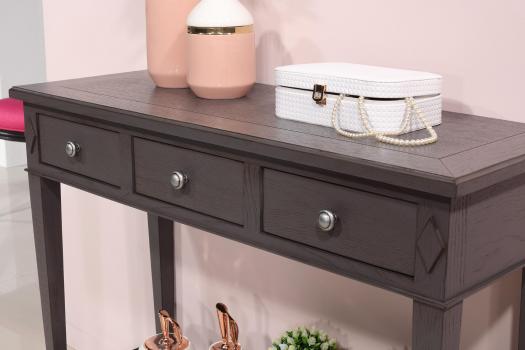 Consola Mathieu fabricada en madera de roble estilo Directoire con un acabado de pátina gris antracita.