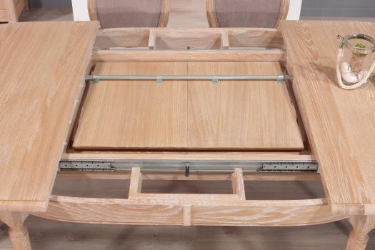 Mesa de comedor ovalada fabricada en madera de roble macizo con 2 extensiones al estilo Luis XVI 